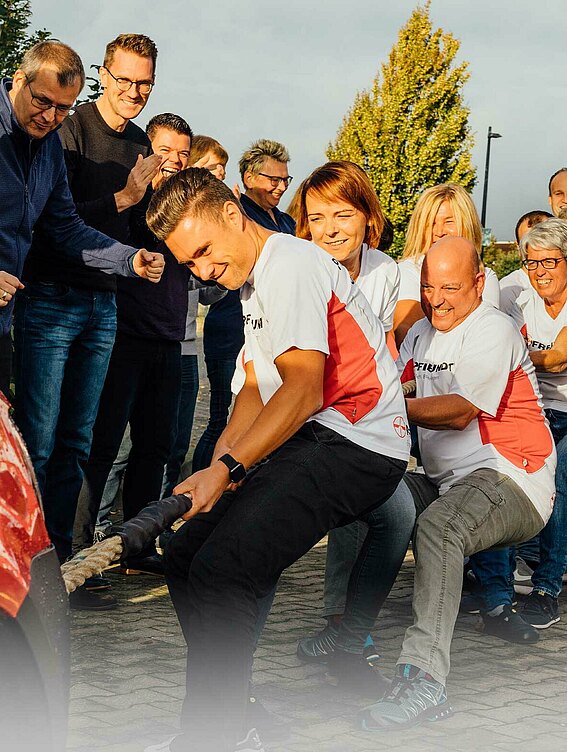 PFREUNDT Teamfoto von einer Mitarbeiteraktion 